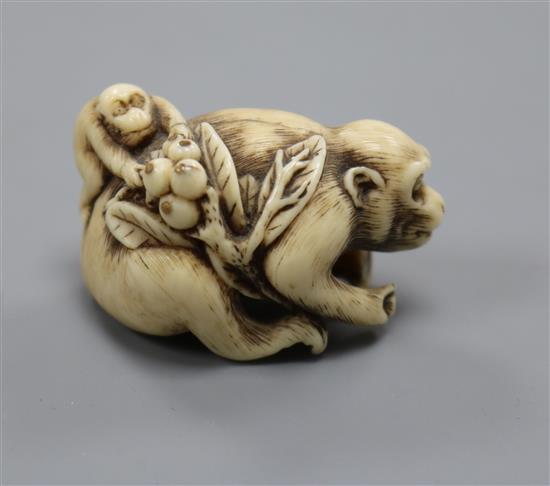 A 19th century Japanese ivory monkey group netsuke
